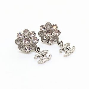 CHANEL Silver Gray Flower CC Dangle Crystal Earrings